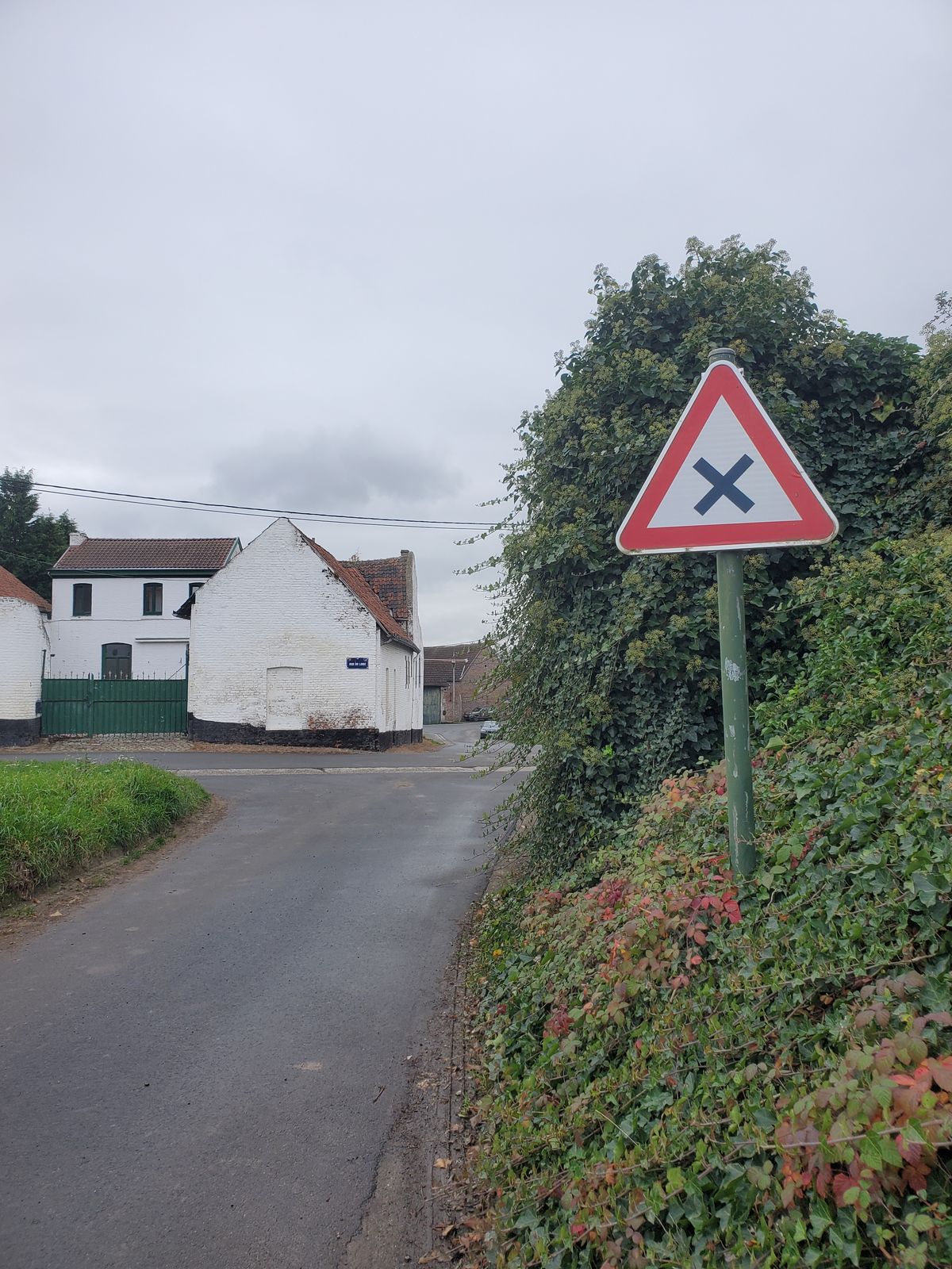 Xhendremael X road sign of its own