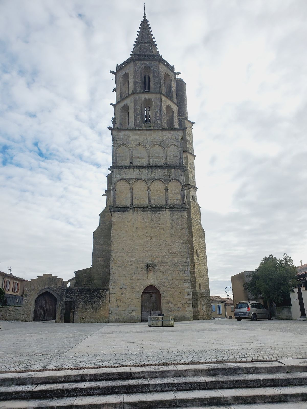 Avignonet-Lauragais church courtyard, with church in the back.